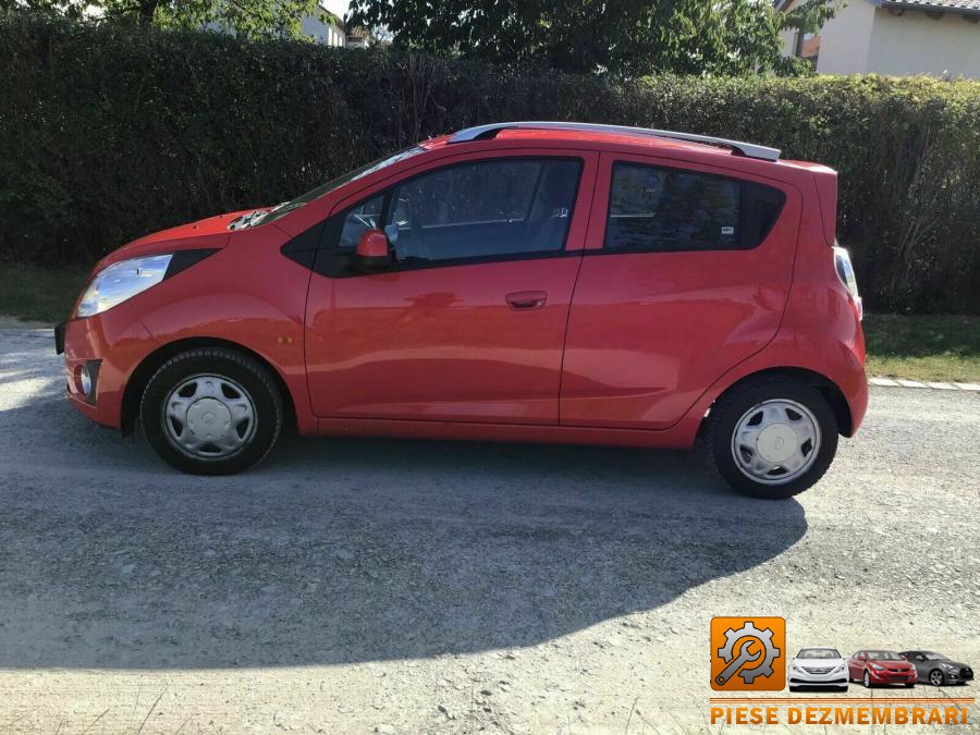 Amortizor capota chevrolet spark 2009