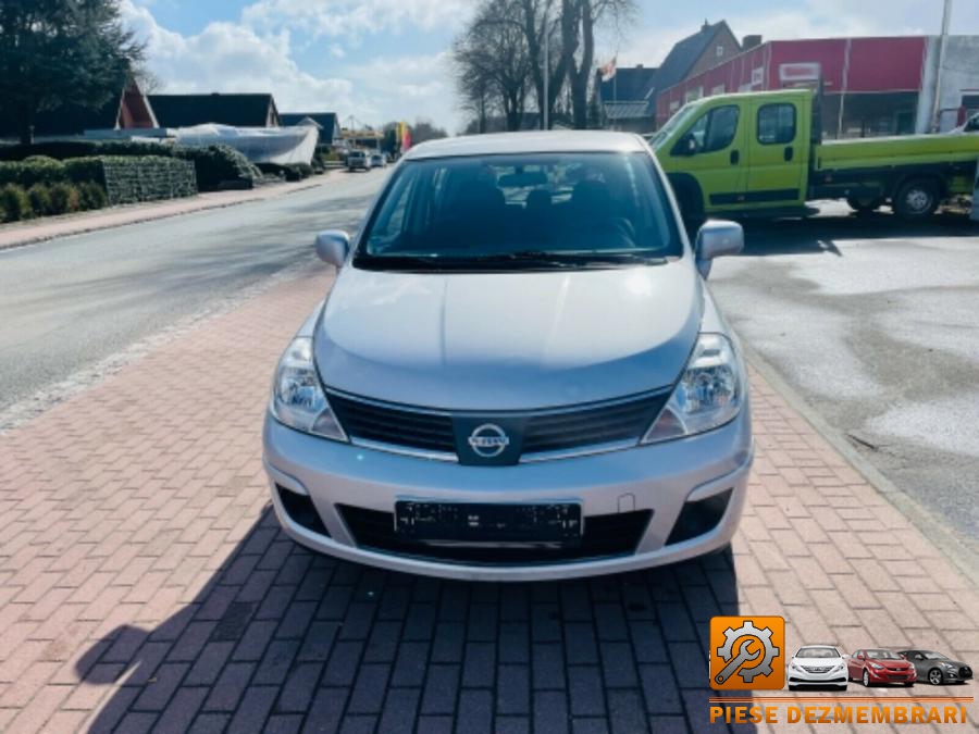 Ansamblu stergatoare nissan tiida 2011