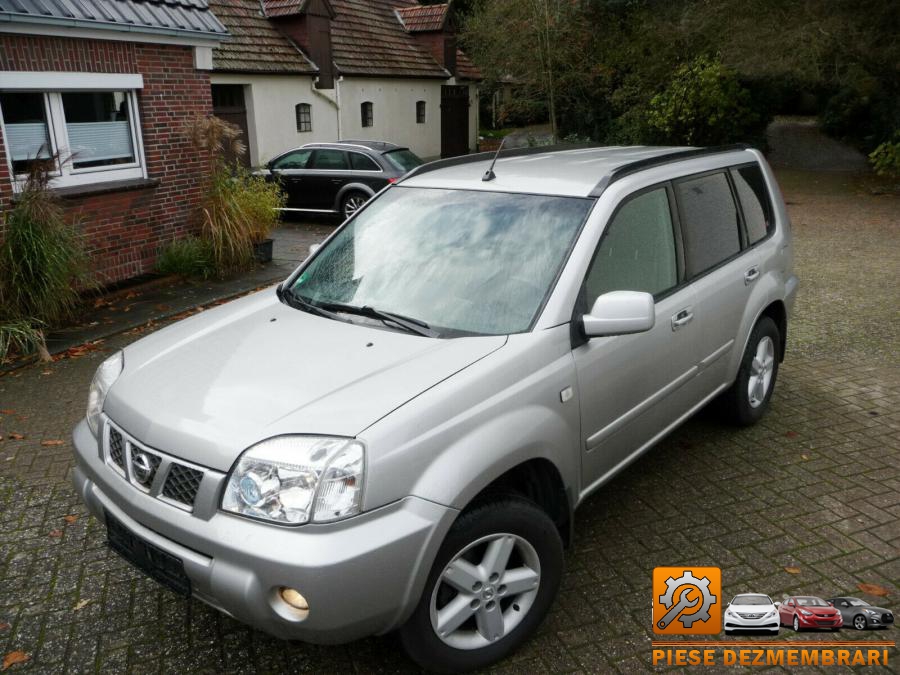 Aripa spate nissan x trail 2011