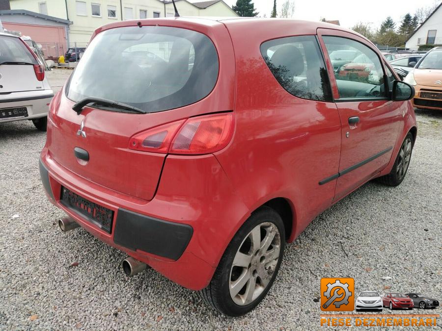 Bascula mitsubishi colt 2010