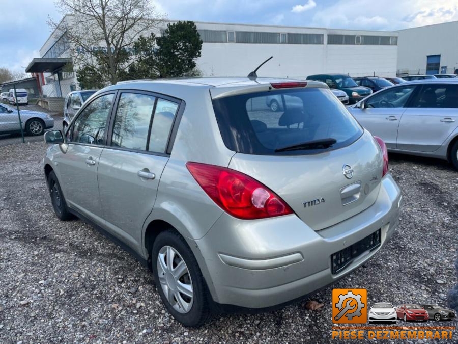 Bascula nissan tiida 2011