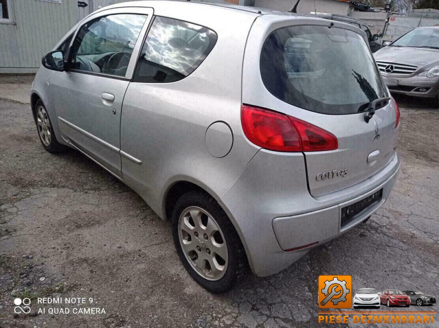 Capac distributie mitsubishi colt 2010