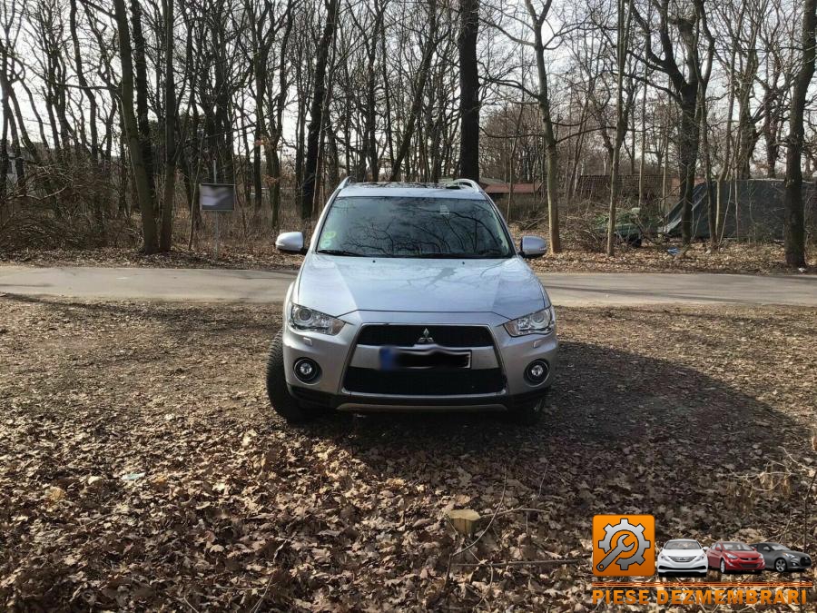 Macara geam mitsubishi outlander 2011