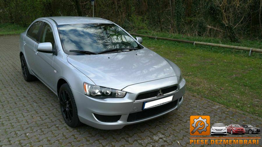 Motoras stropitor parbriz mitsubishi lancer 2008