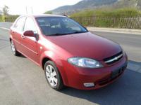 Amortizor capota chevrolet lacetti 2004